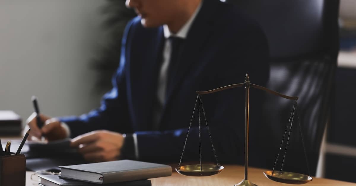 an attorney works at his desk | Coplan and Crane